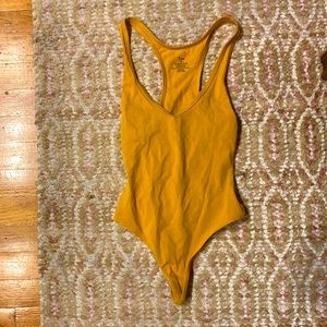 TNA thong racerback bodysuit - vneck in poppy